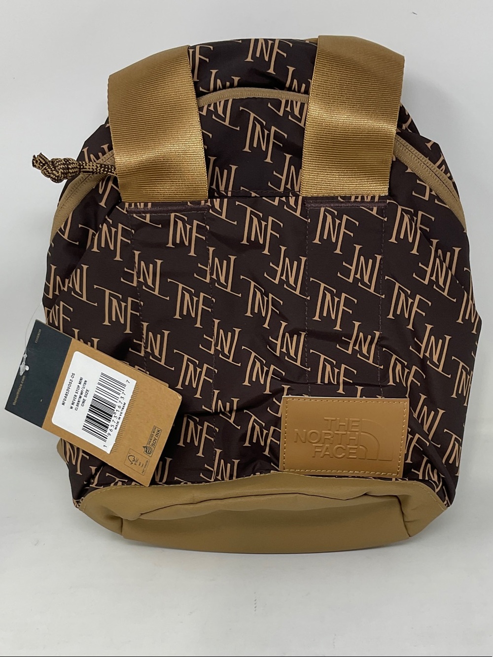 The North Face Brown Monogram Backpack with Tan Accents